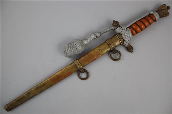 A German WWII Third Reich naval officers dagger, by F.W. Holler Solingen, overall 16.5in.